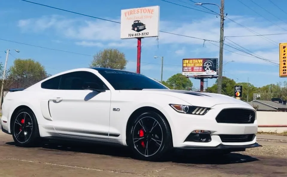 White Ford Mustang after a professional full detail at Firestone Auto Detail