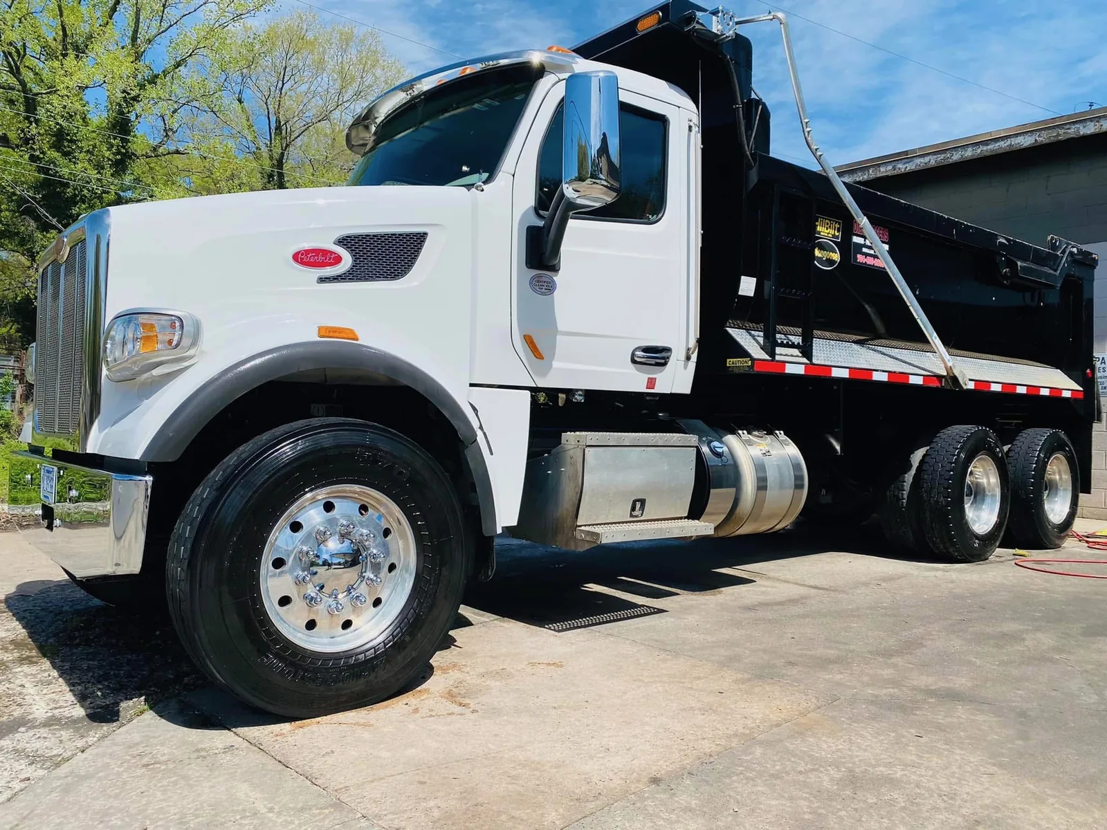 White Peterbilt dump truck after professional commercial vehicle detailing in Gastonia, North Carolina