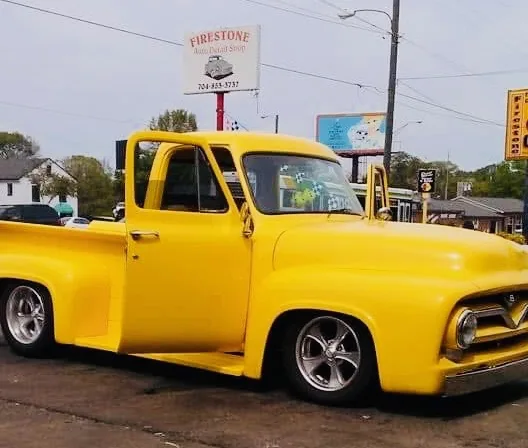 Yellow classic Ford pickup after professional detailing in Gastonia, North Carolina