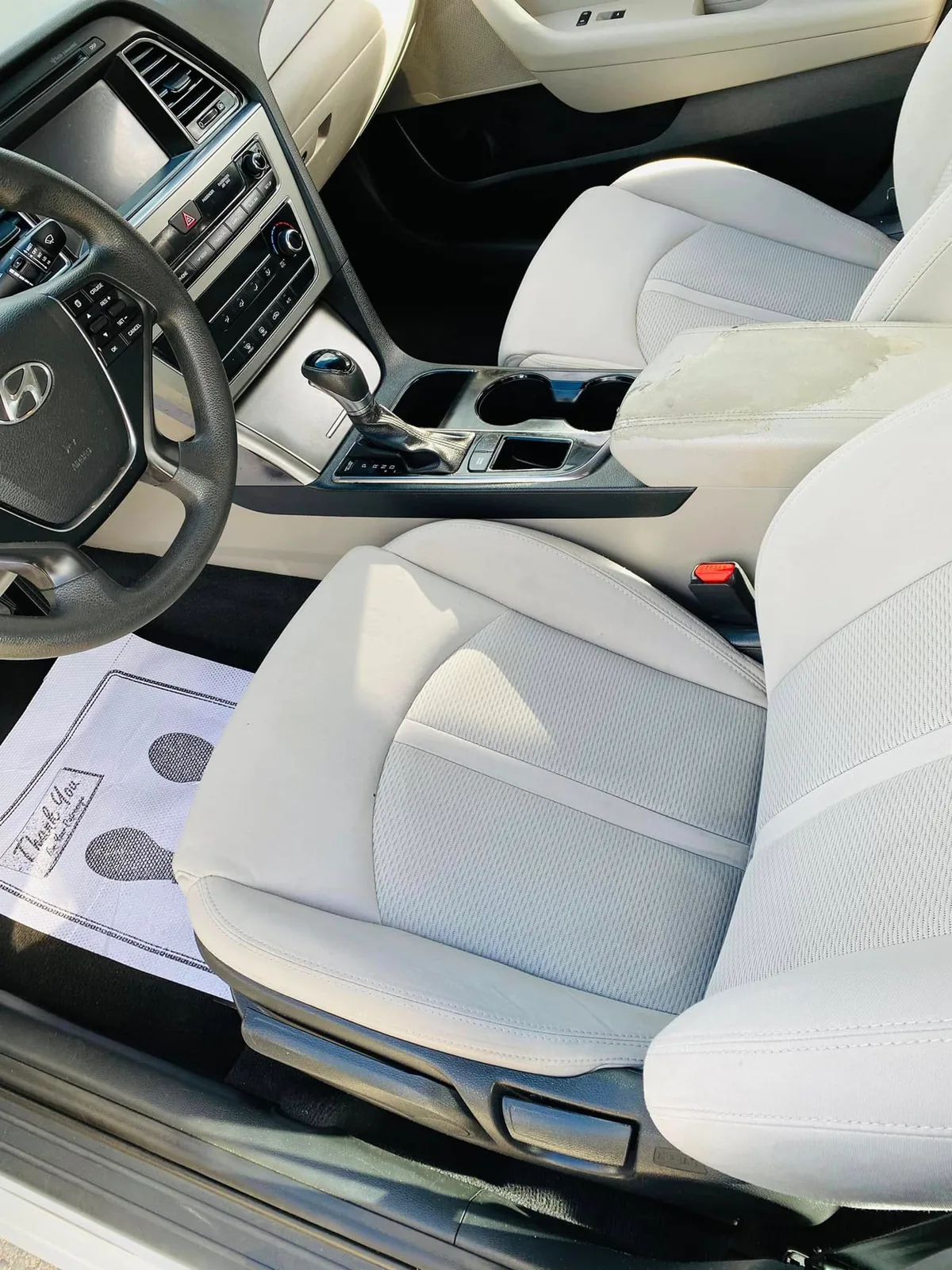 Cleaned front seats and console after interior detailing in Gastonia