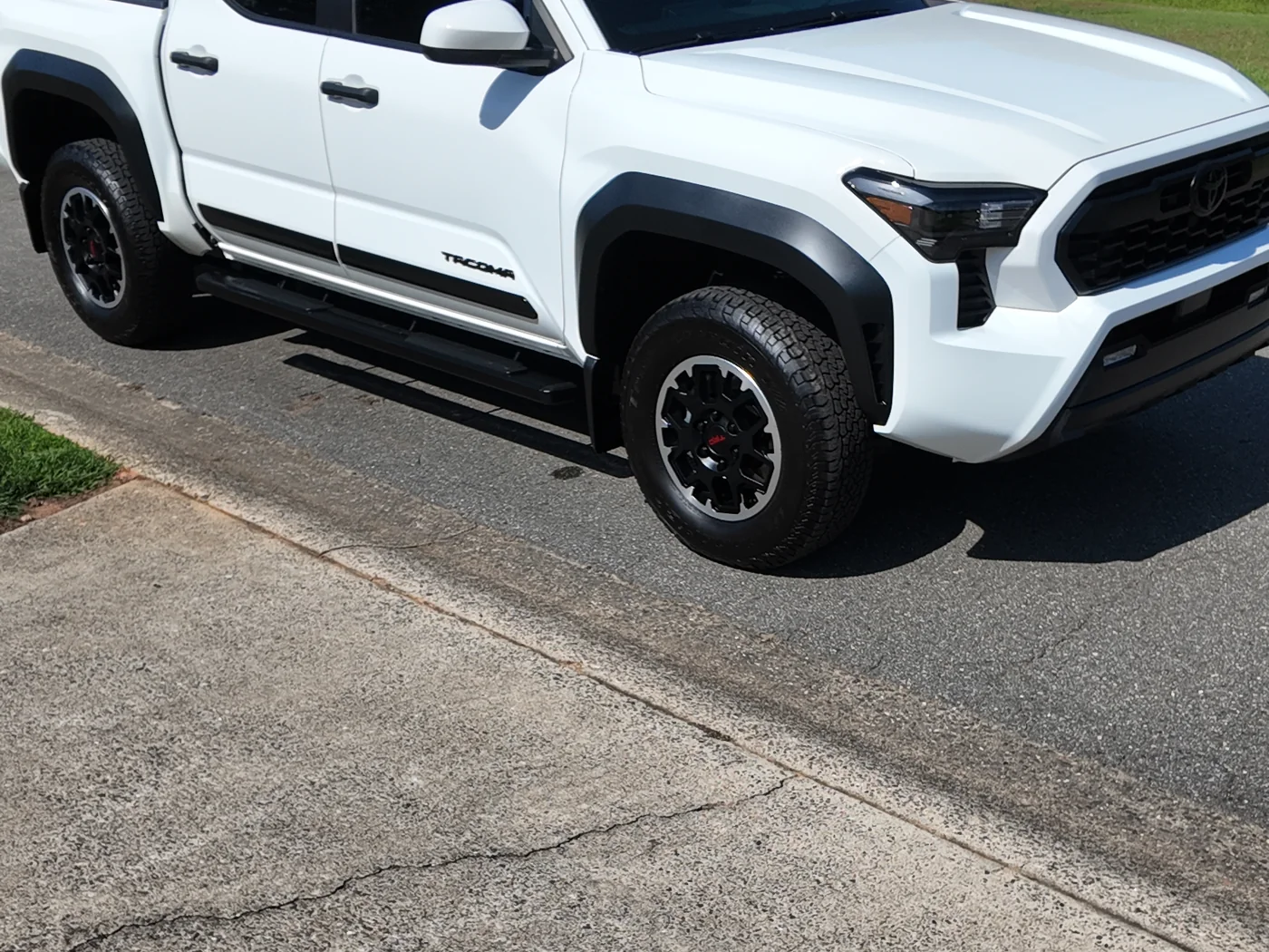 Finished Ice Cap white Toyota Tacoma after professional auto detailing in Gastonia, North Carolina