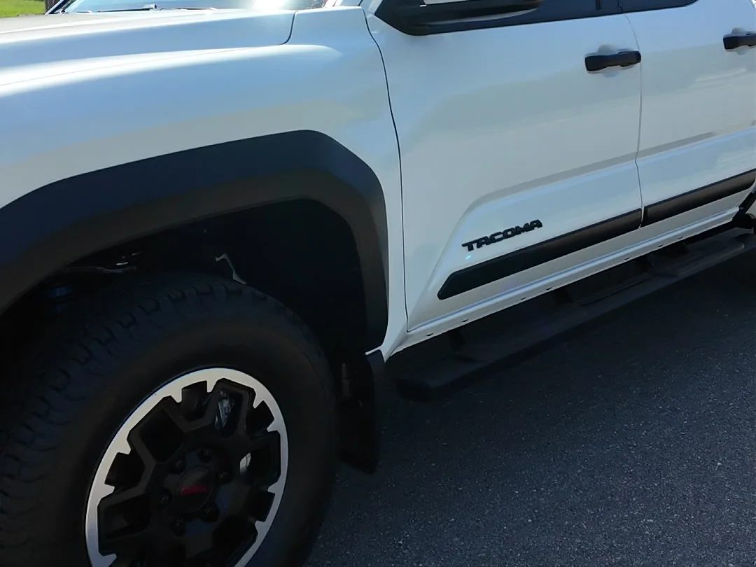 Finished Toyota Tacoma wheel and tire after a Full Auto Detail by Firestone Auto Detail